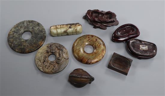 A Chinese jade chilong bi disc, two hardstone bi discs and two other carvings